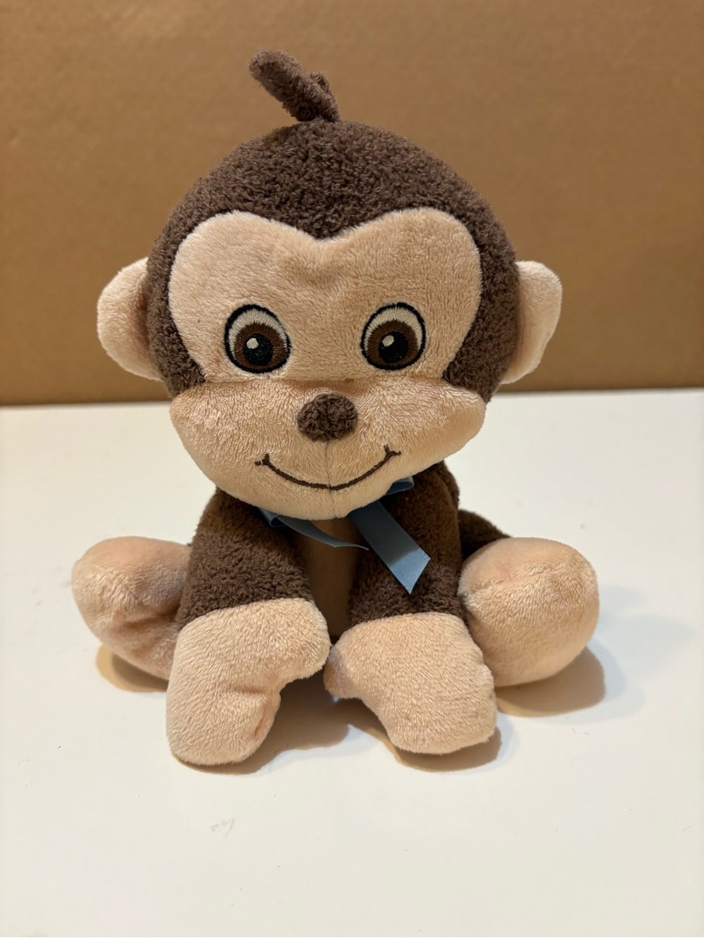 Garanimals Brown Monkey Plush 6"
Blue Bow Embroidered Sewn Eyes
Baby Lovey 2010